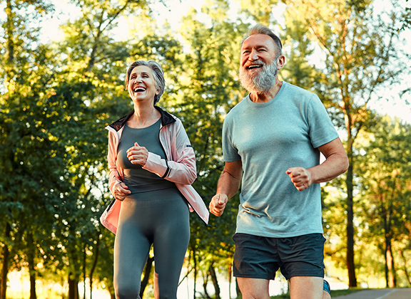 couple jogging on a trail